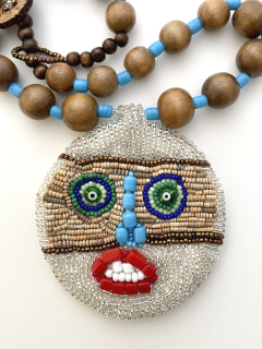 Designer necklace with pendant mask