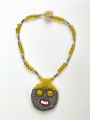 pendant-mask embroidered with metallic beads