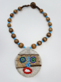 Designer jewel - mask pendant in Djenné pearls and Czech pearls