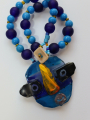 African beads and thermoformed glass mask