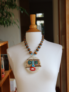 Contemporary and ethnic necklace - view on mannequin