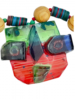 Red and green coloured glass mask